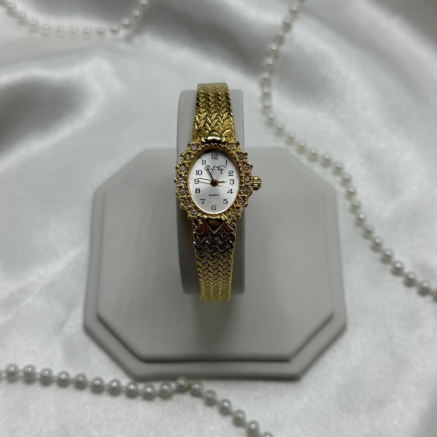 Vintage gold tone diamanté watch with quartz movement