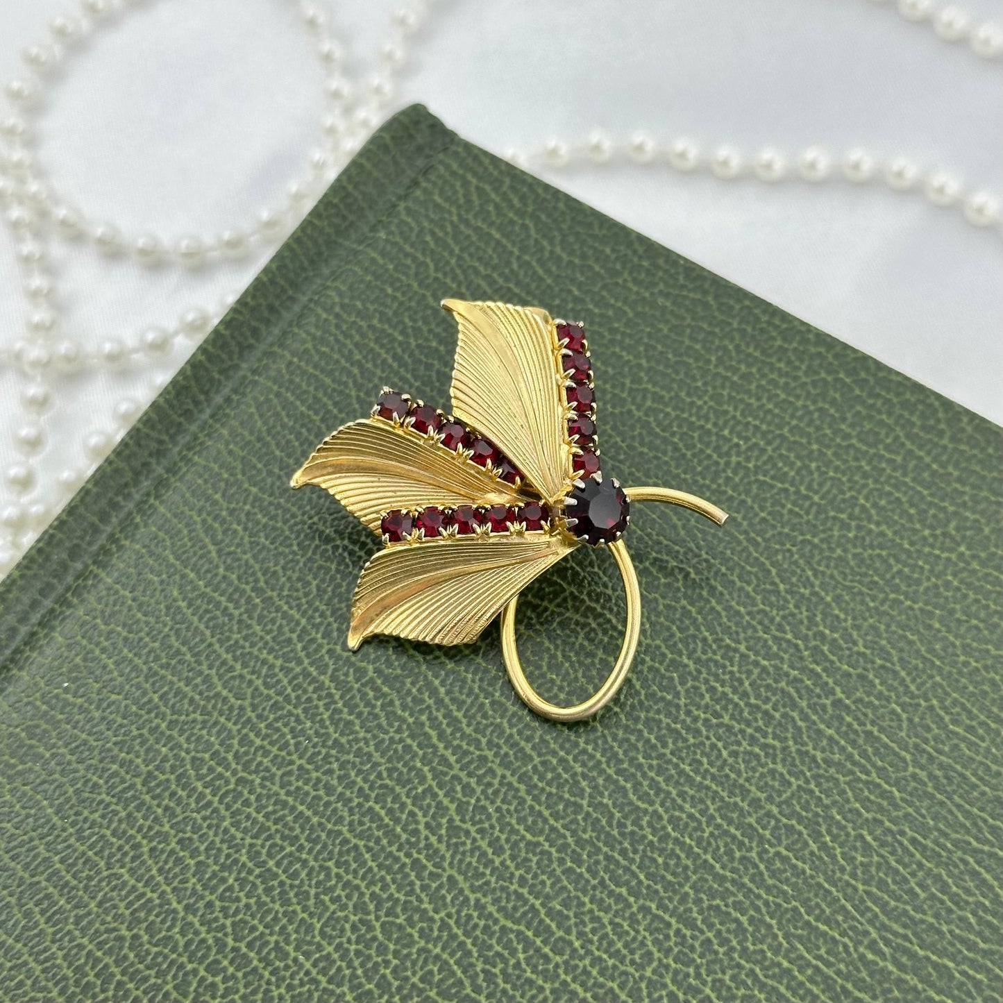 Gold Leaf Brooch with Red Stones