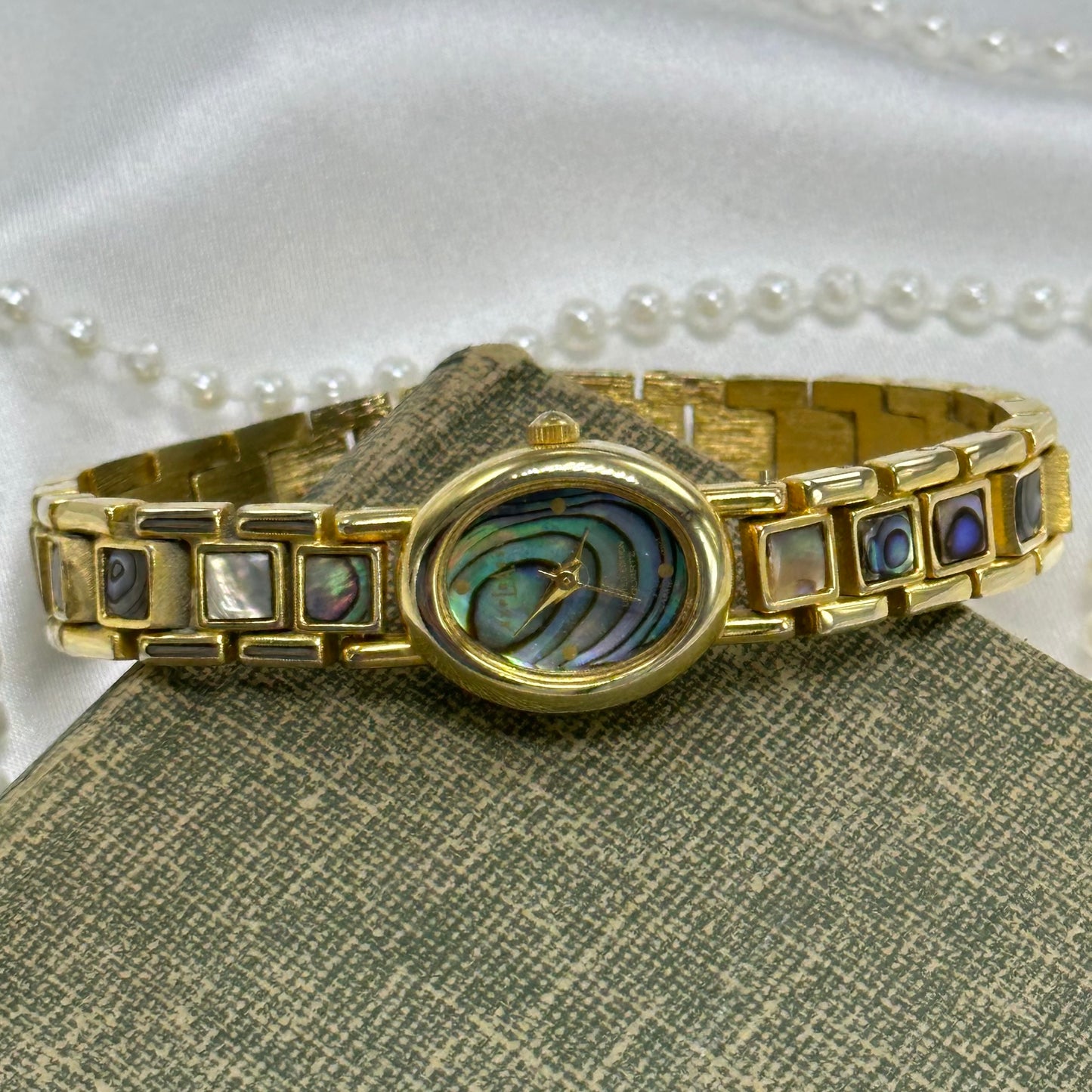 Oval Dial Gold Abalone Watch