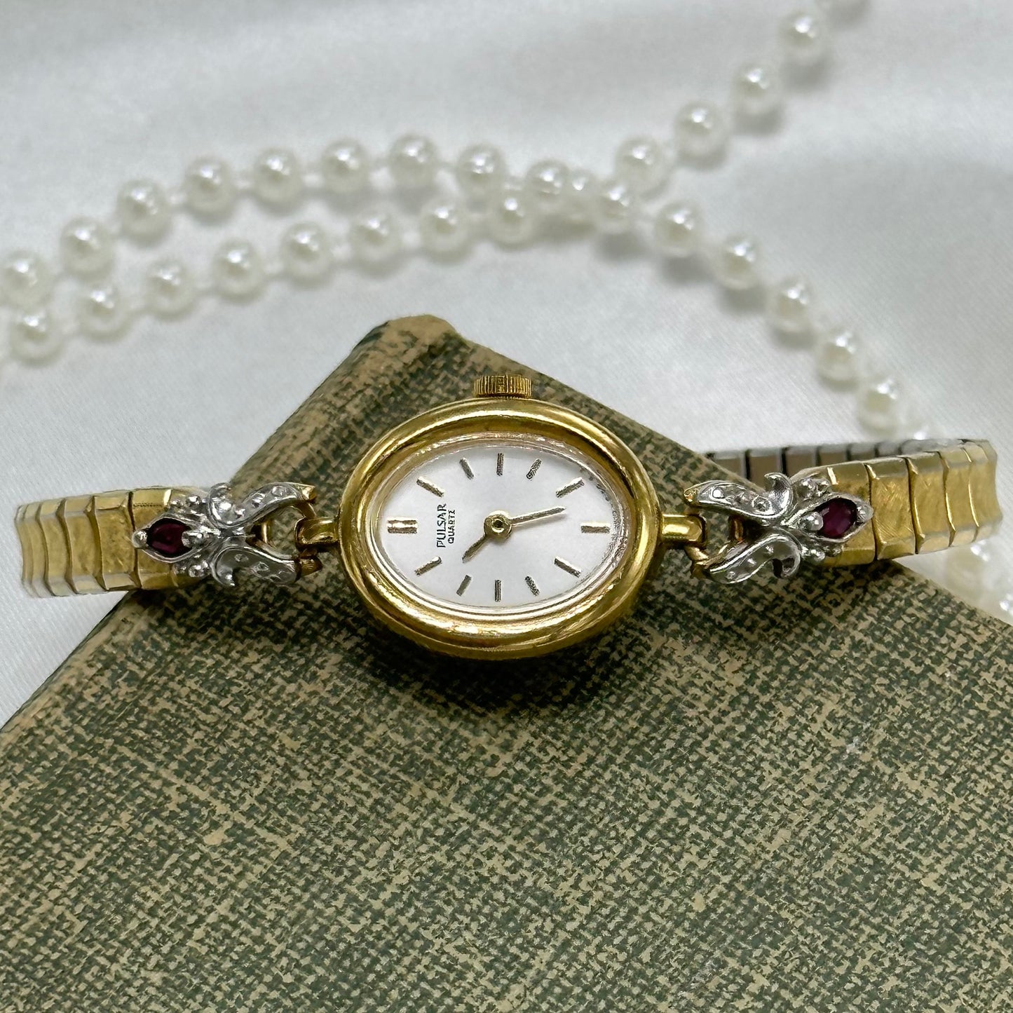 Dainty Ruby Pulsar Watch with Oval Dial