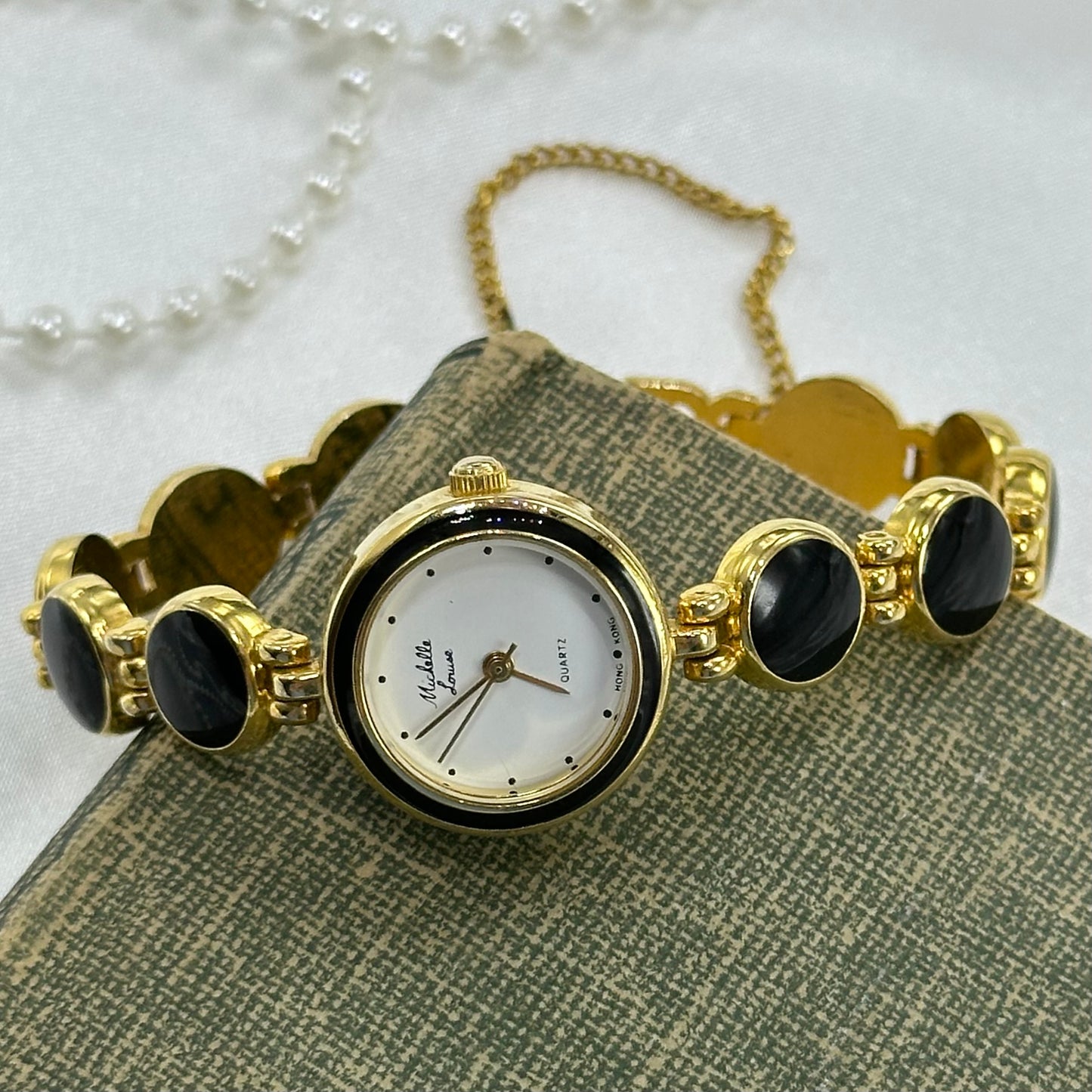 Elegant Round Dial Gold and Black Watch