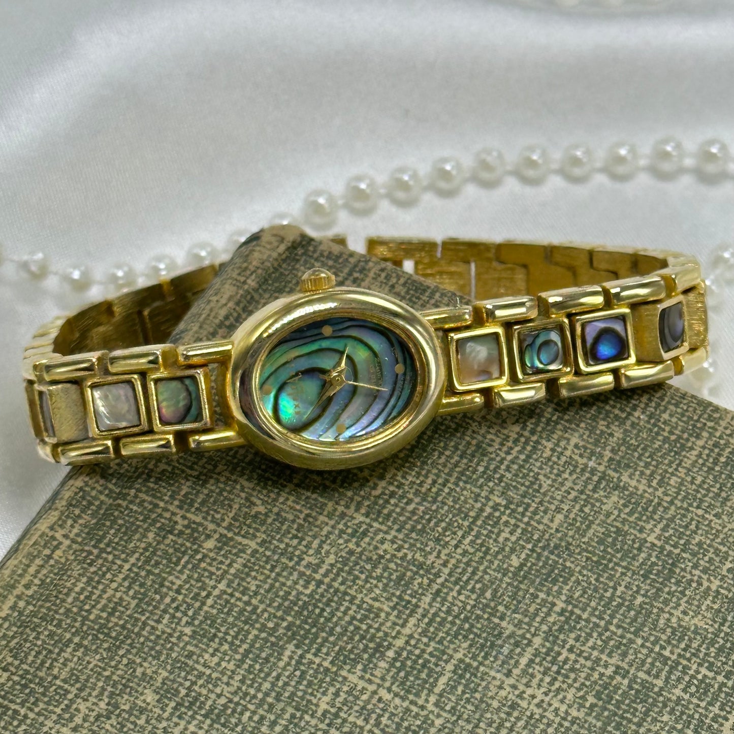 Oval Dial Gold Abalone Watch