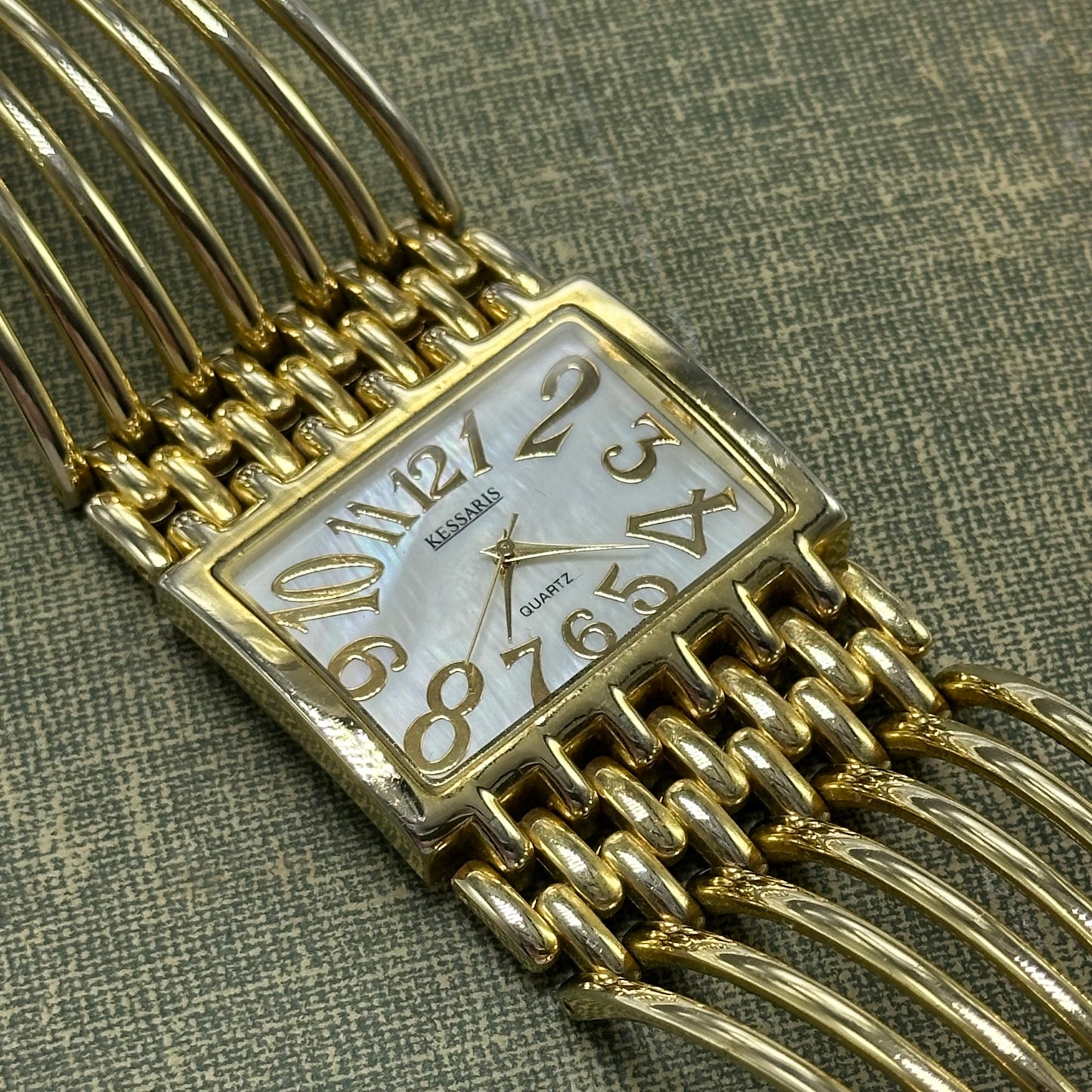 Chunky Gold Cuff Watch with Mother of Pearl Dial