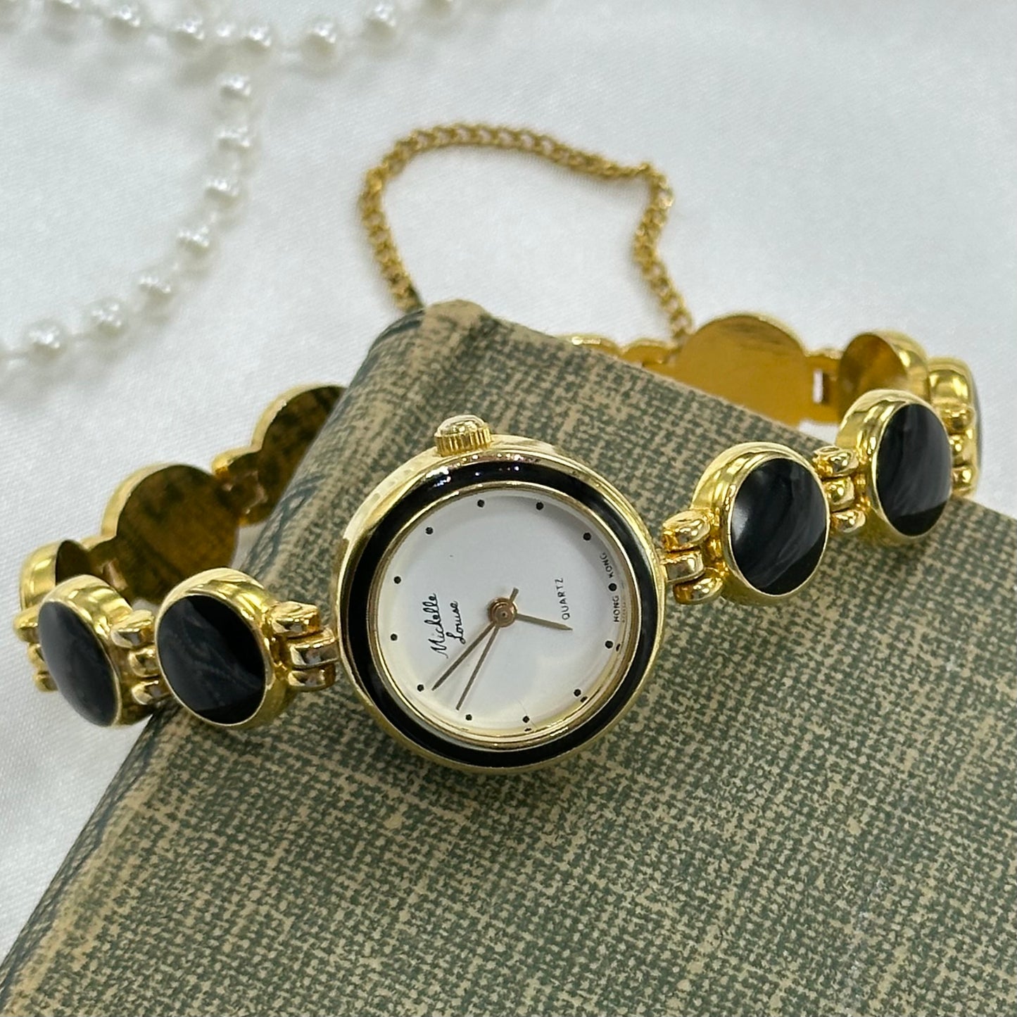 Elegant Round Dial Gold and Black Watch
