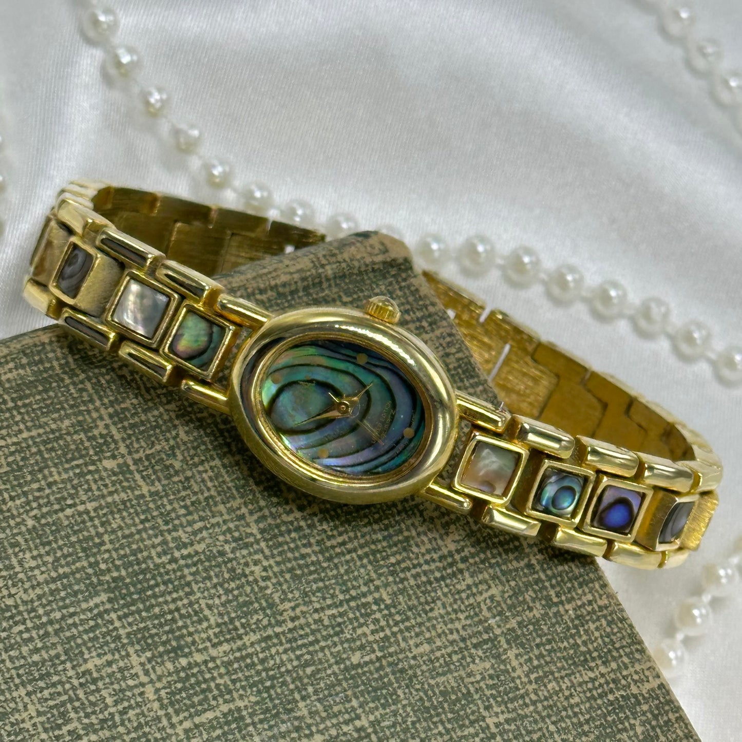 Oval Dial Gold Abalone Watch