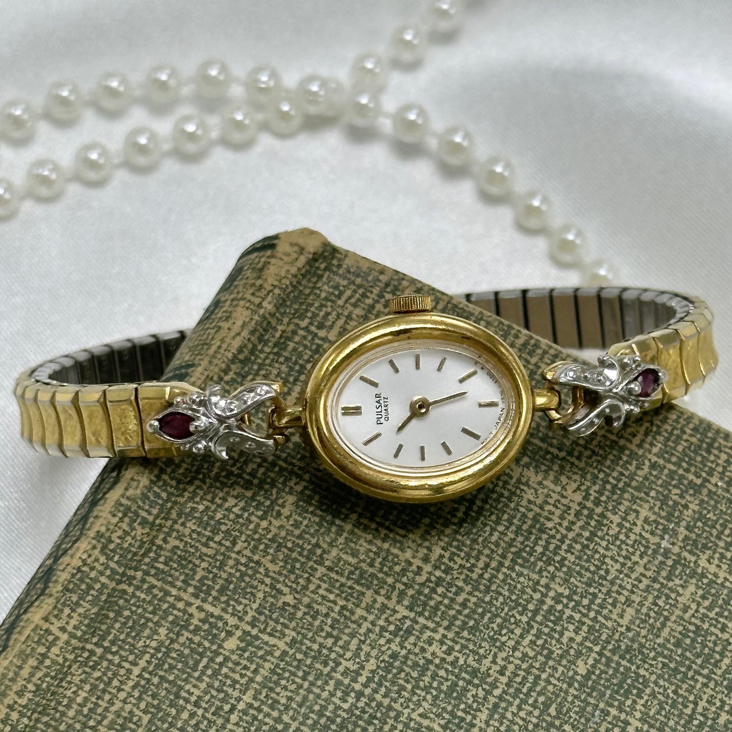 Dainty Ruby Pulsar Watch with Oval Dial