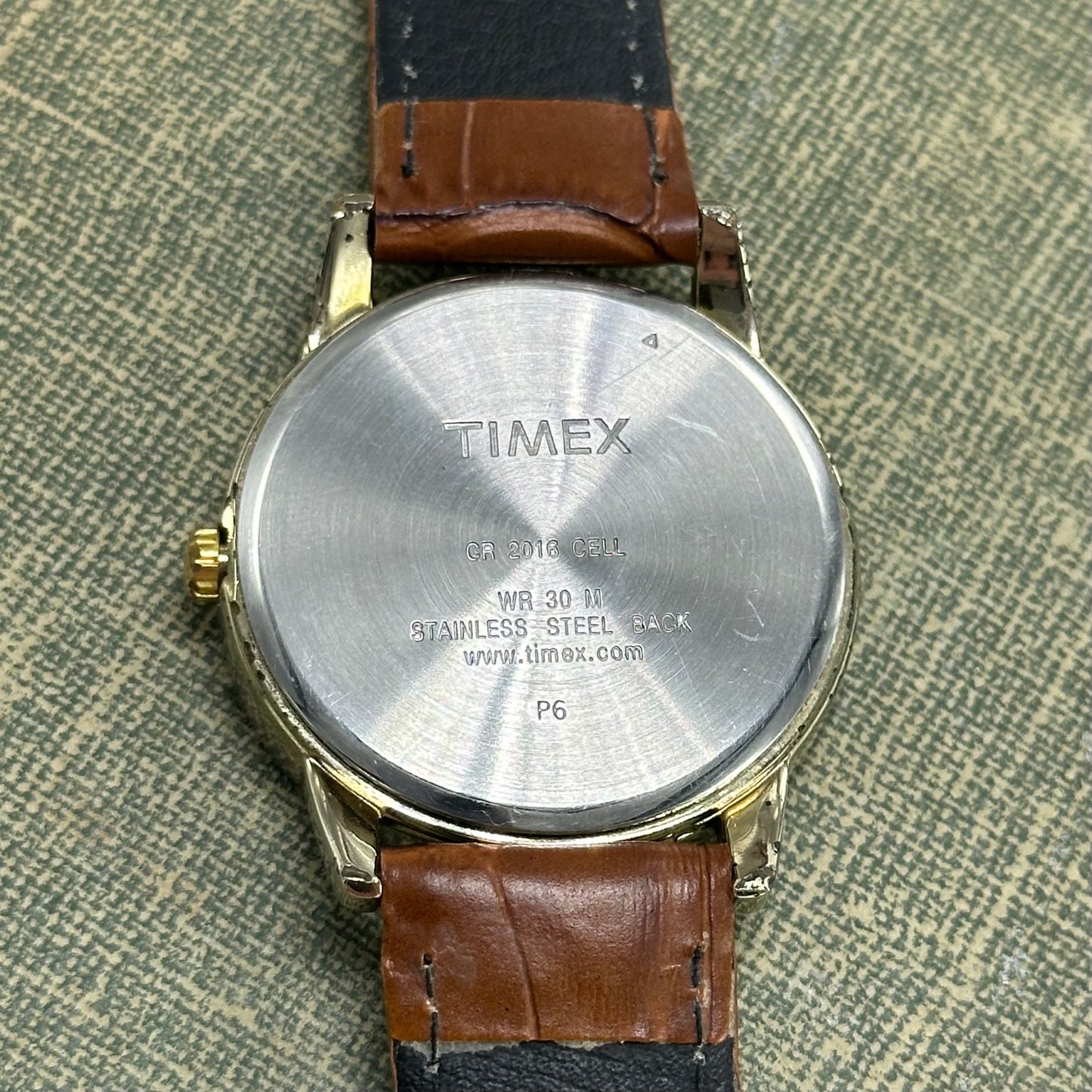 Gold and Brown Timex Indiglo Watch