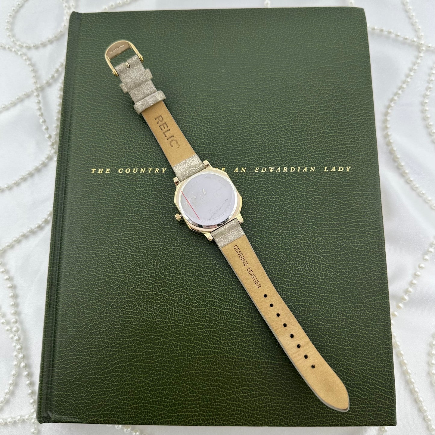 Gold Relic Diamanté Watch with Metallic Leather Band and Date Display