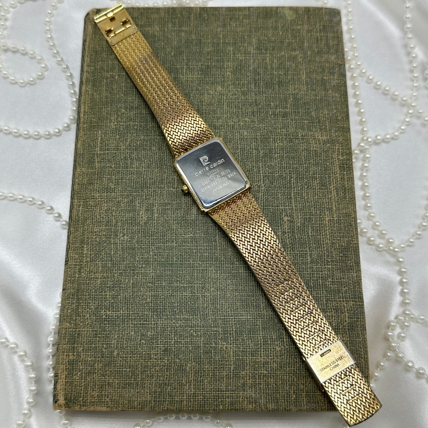 Vintage Pierre Cardin Gold Tank Watch with Black Dial and Diamond Markers