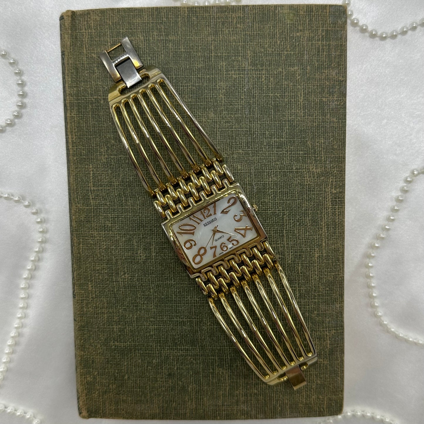 Chunky Gold Cuff Watch with Mother of Pearl Dial