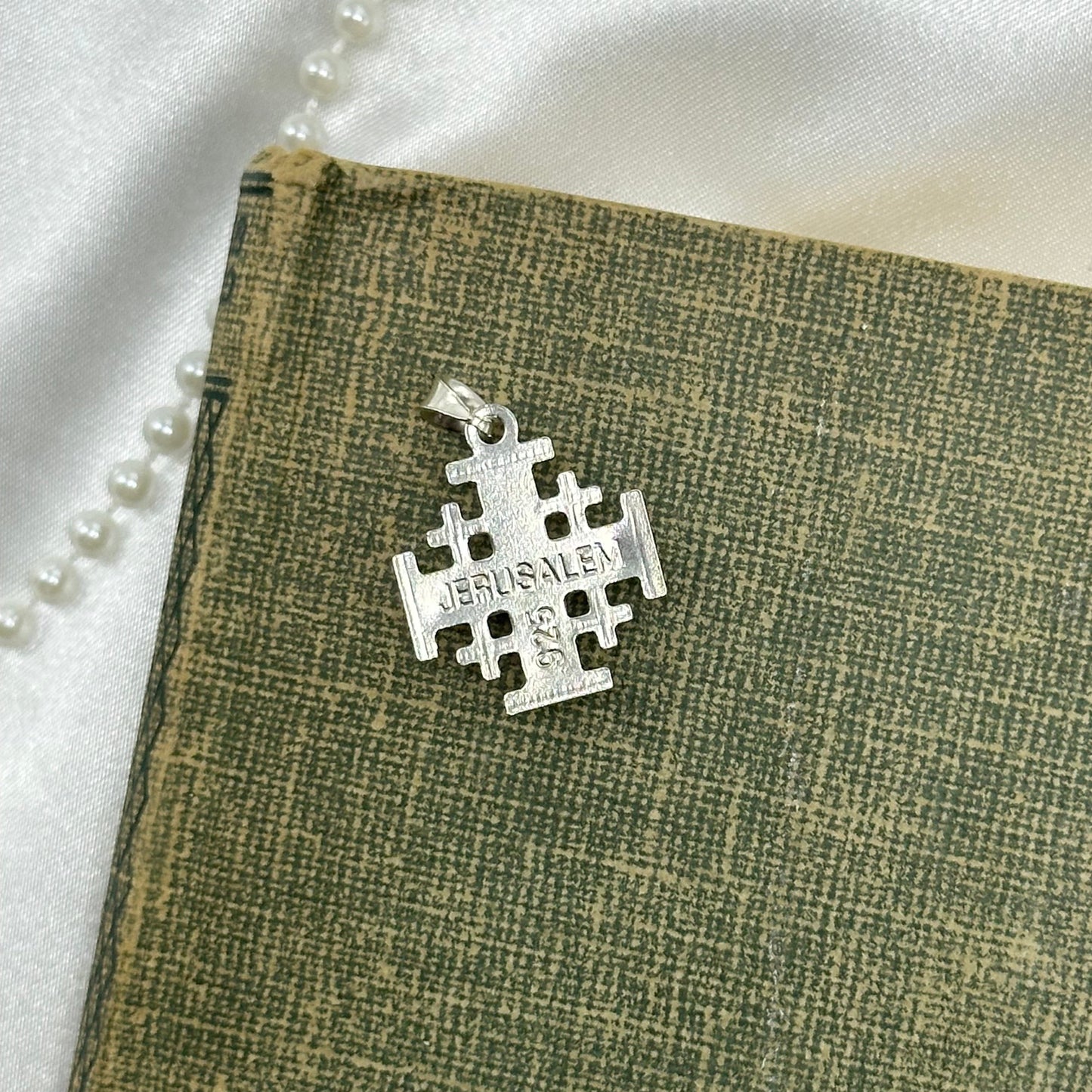 925 sterling silver Jerusalem pendant. Diamond cut front. Unique back