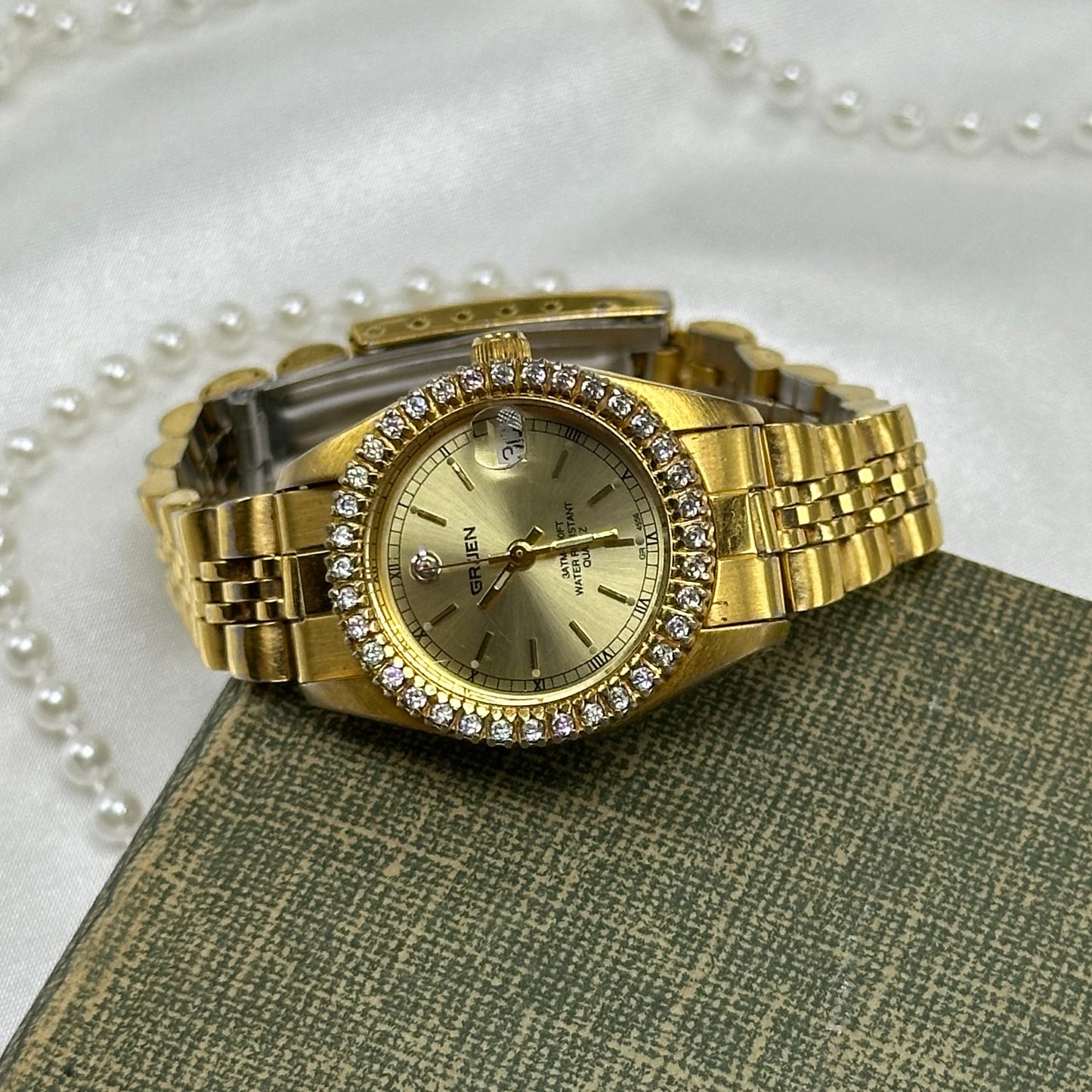 Gold Gruen Water Resistant Watch with Date Display