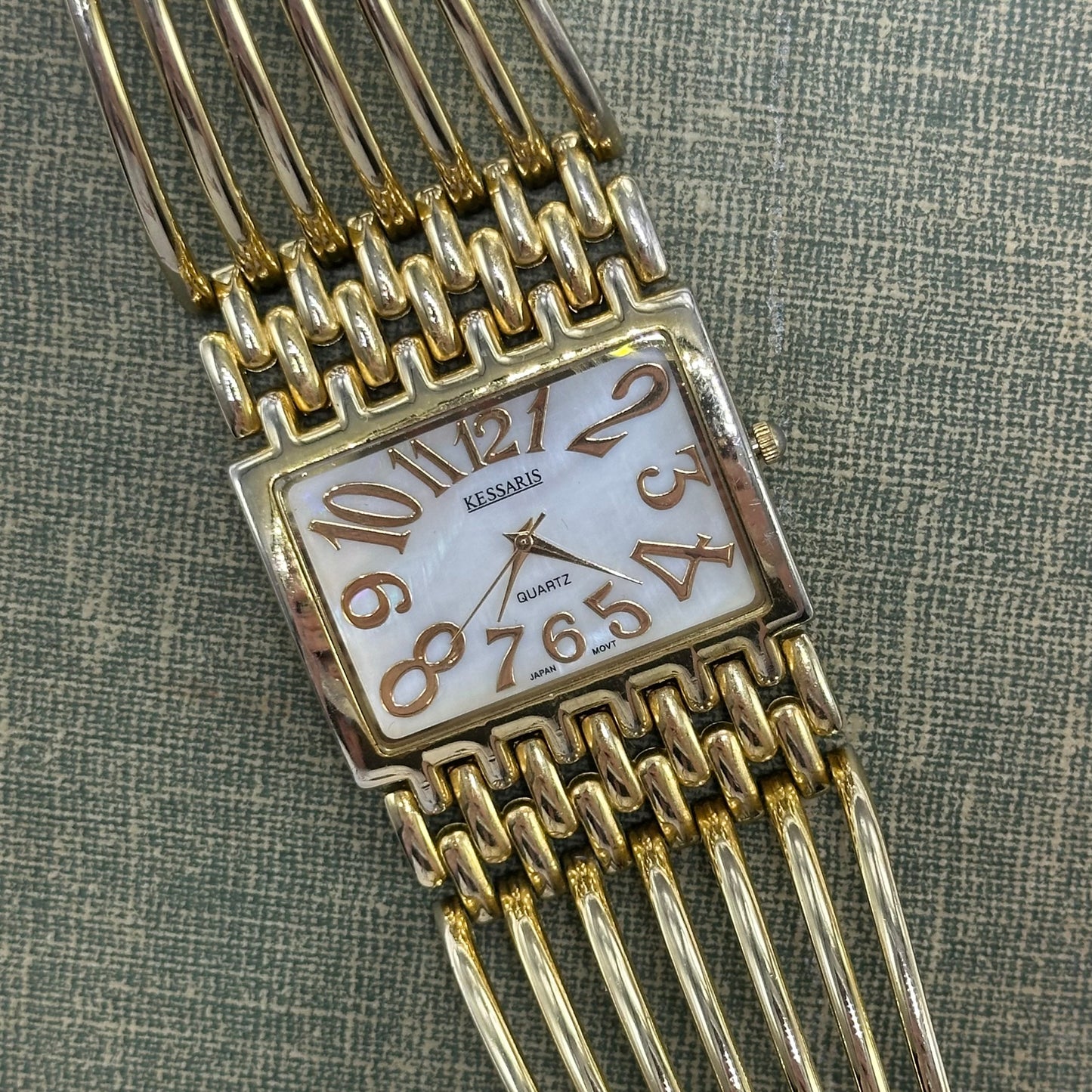 Chunky Gold Cuff Watch with Mother of Pearl Dial