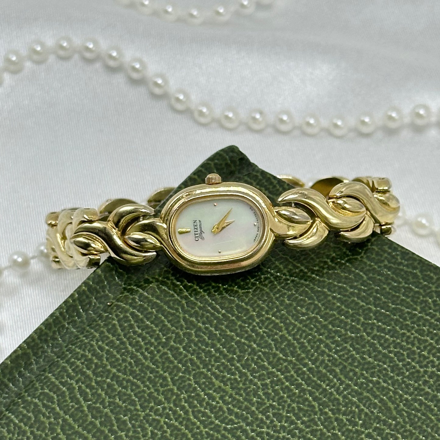 Dainty Gold Citizen Watch with Mother of Pearl Dial