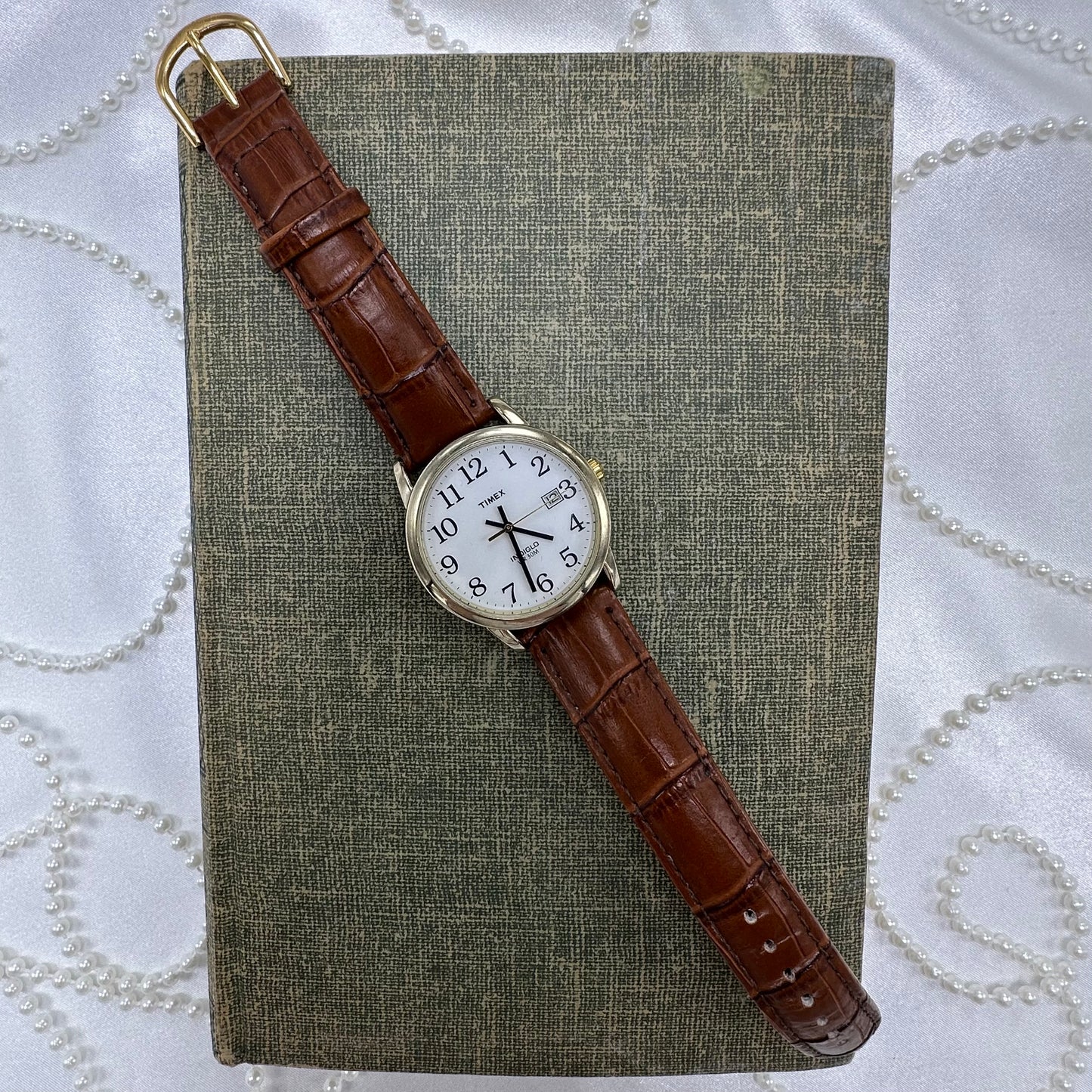 Gold and Brown Timex Indiglo Watch