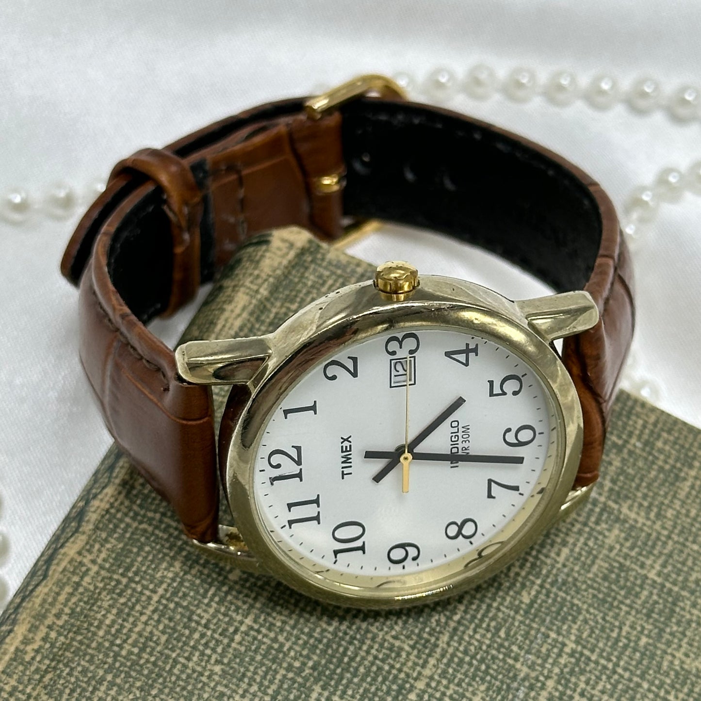 Gold and Brown Timex Indiglo Watch