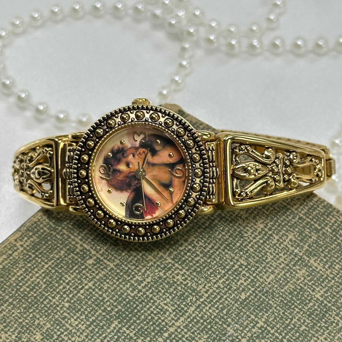 Gold Cherub Watch