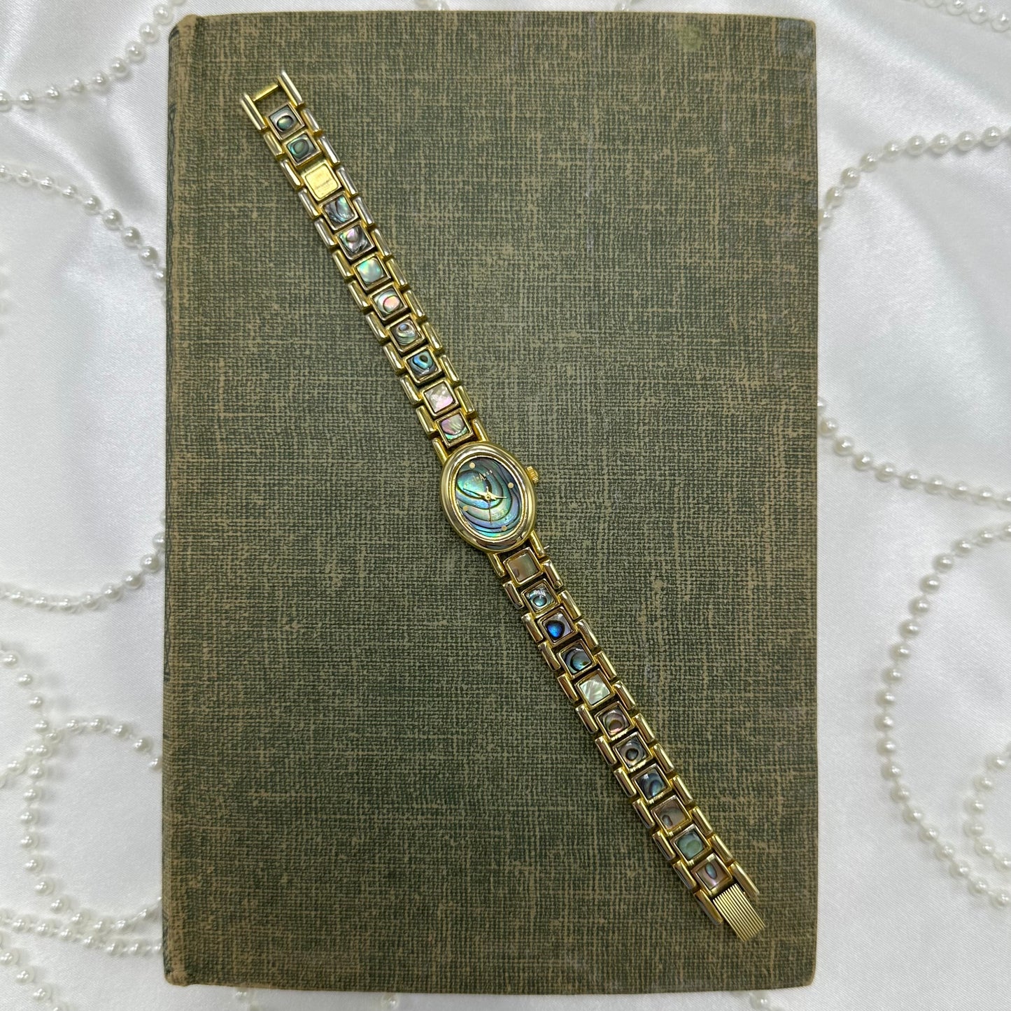 Oval Dial Gold Abalone Watch