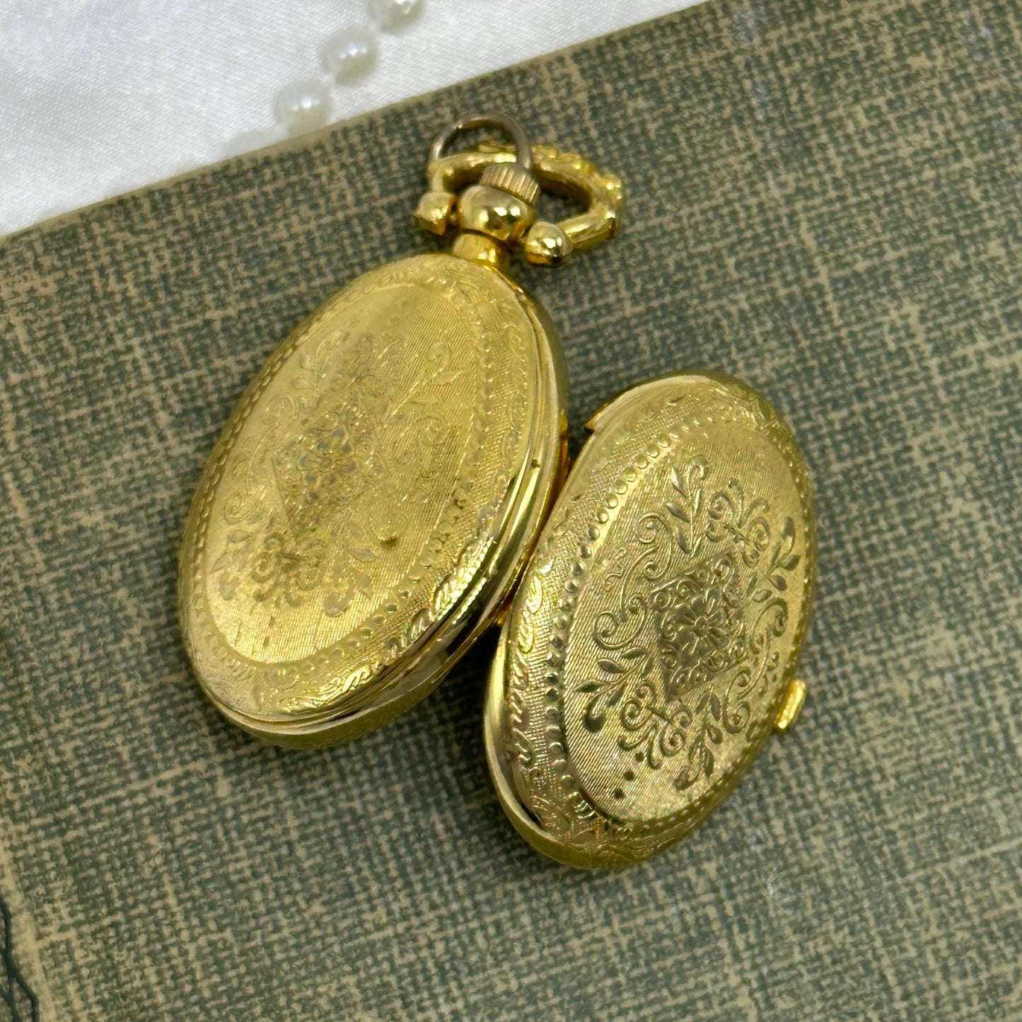Gold Floral Locket Watch with Butterfly and Flower Picture