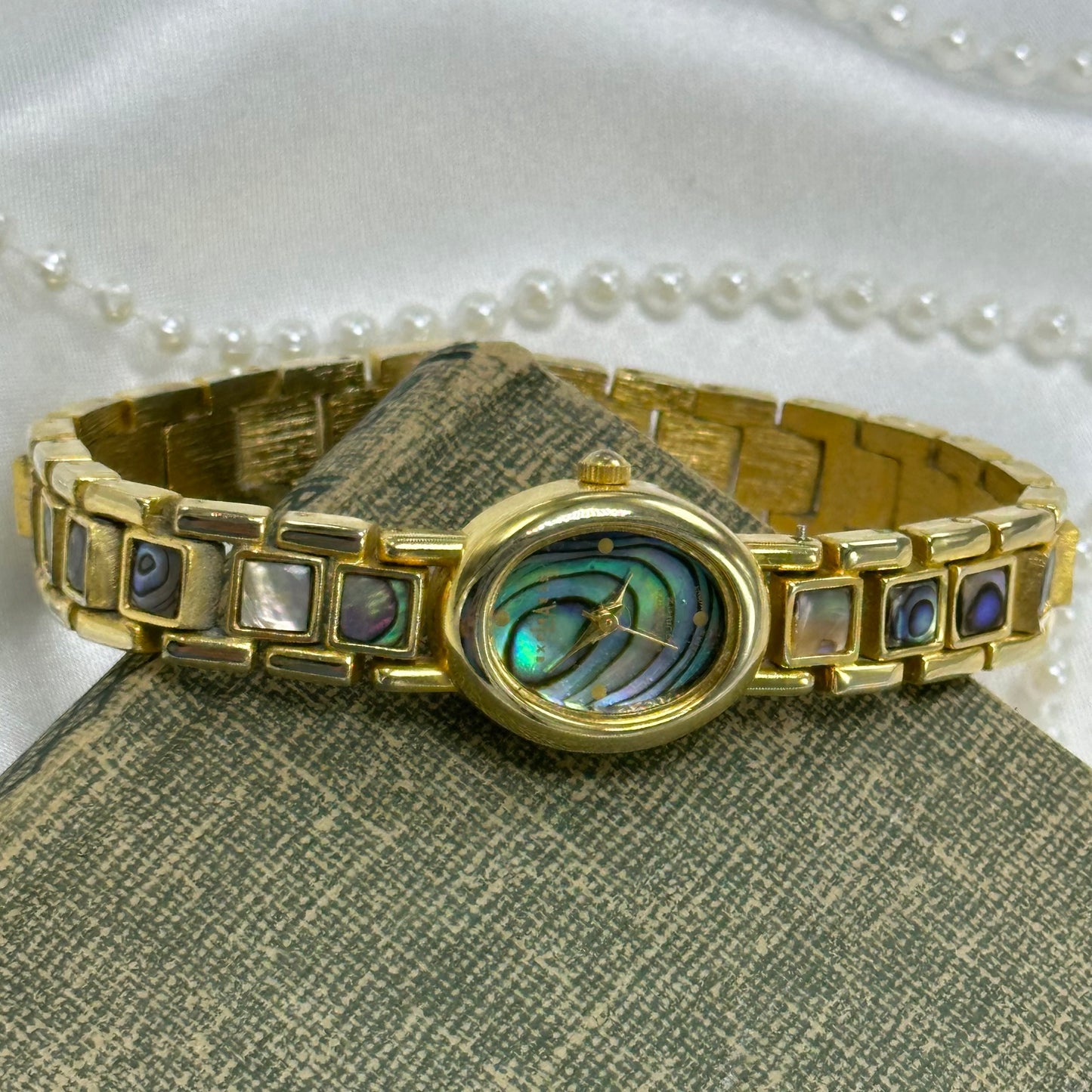 Oval Dial Gold Abalone Watch