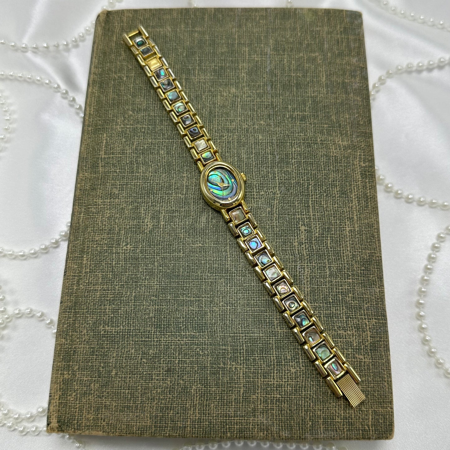 Oval Dial Gold Abalone Watch