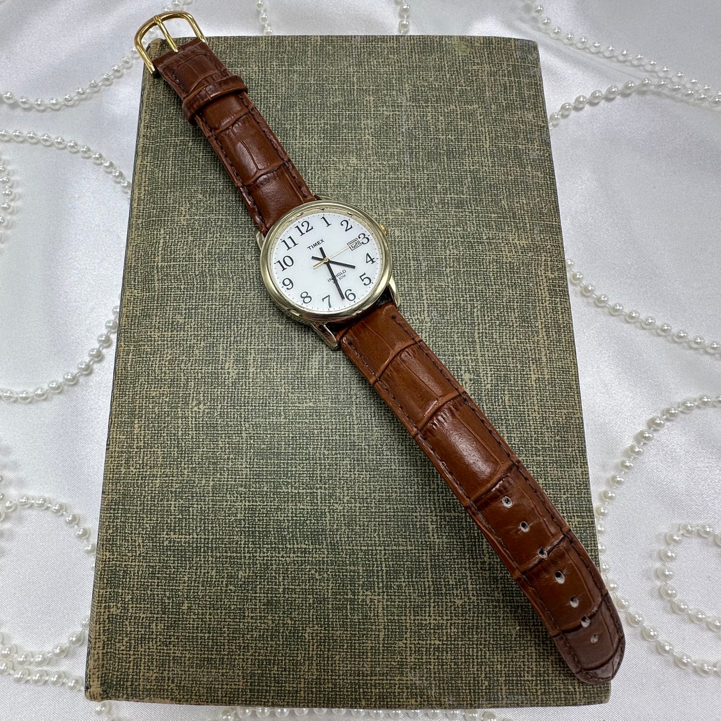 Gold and Brown Timex Indiglo Watch