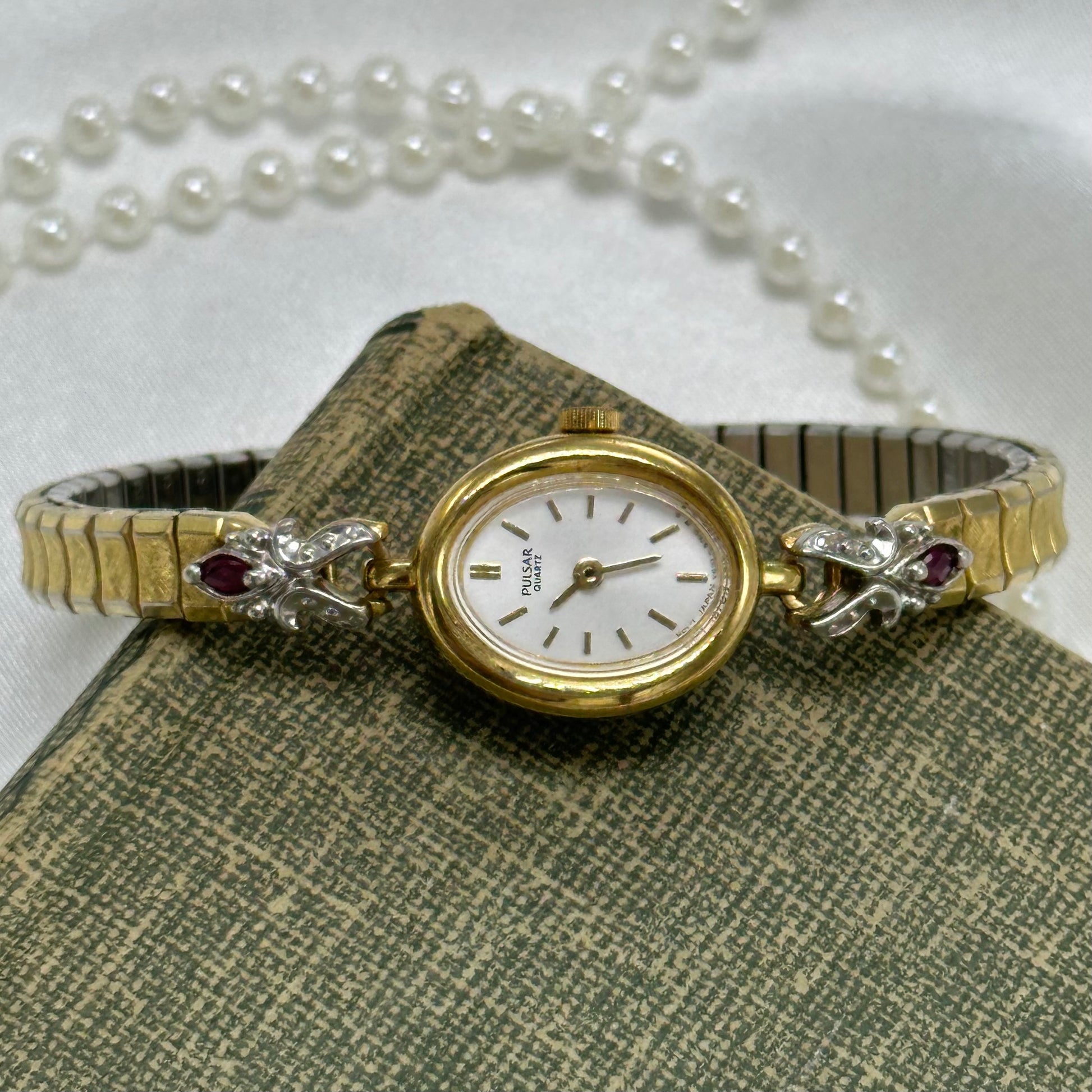 Dainty Ruby Pulsar Watch with Oval Dial