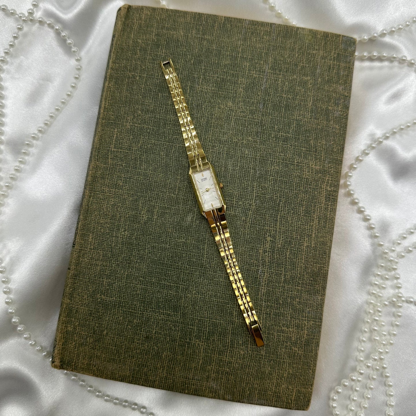 Dainty gold tone Citizen watch with quartz