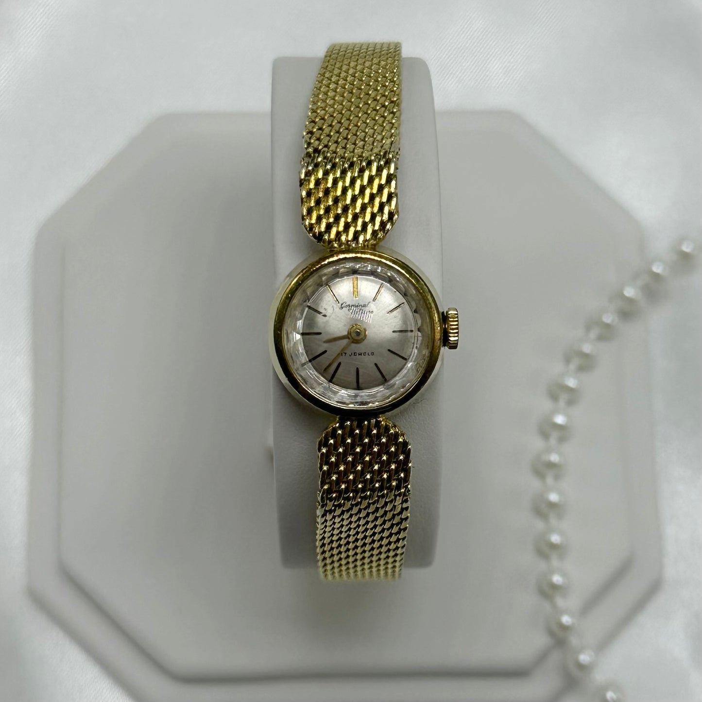 Dainty gold tone Germinal Voltaire manual winding watch
