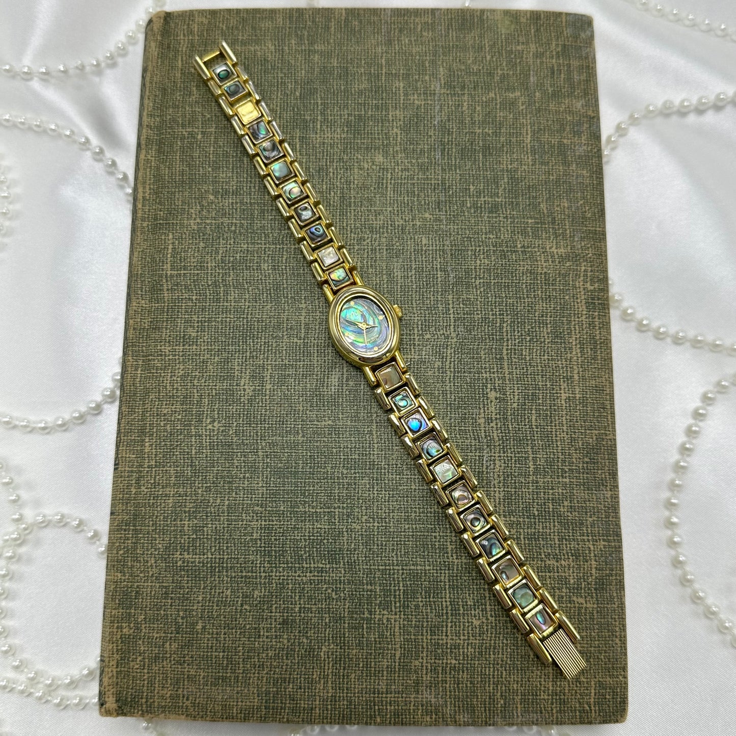 Oval Dial Gold Abalone Watch