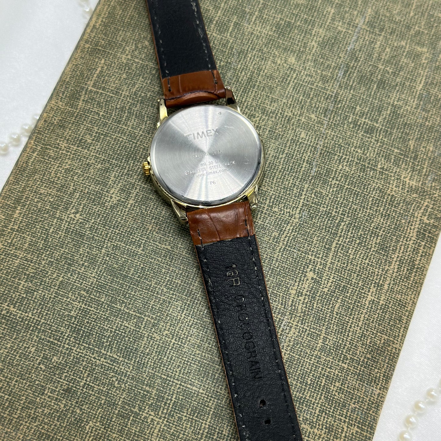 Gold and Brown Timex Indiglo Watch