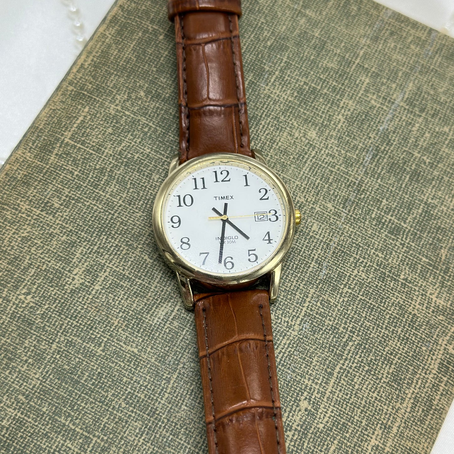 Gold and Brown Timex Indiglo Watch