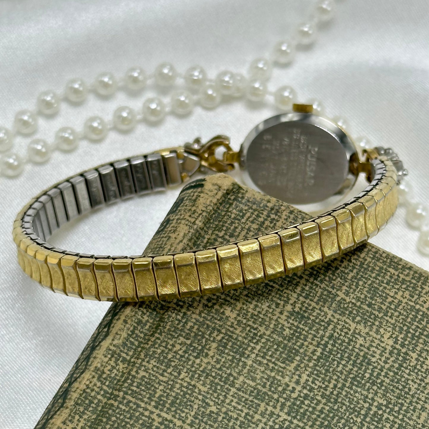 Dainty Ruby Pulsar Watch with Oval Dial