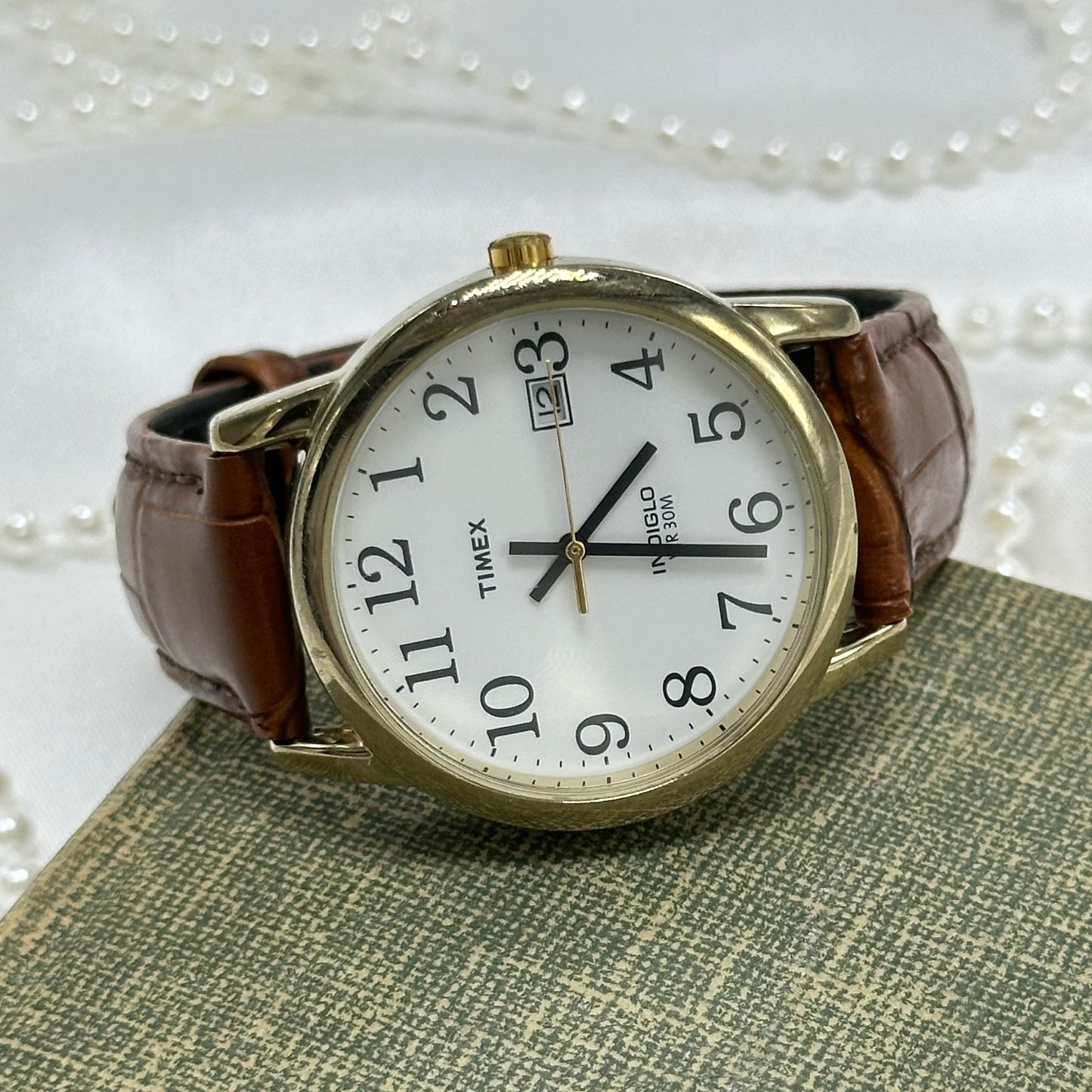 Gold and Brown Timex Indiglo Watch