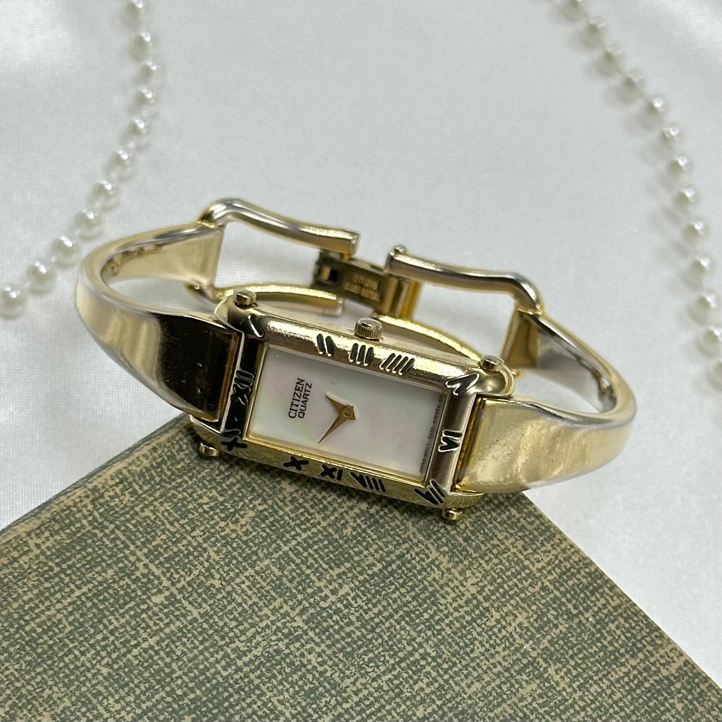 Gold Cuff Watch with Mother of Pearl Dial
