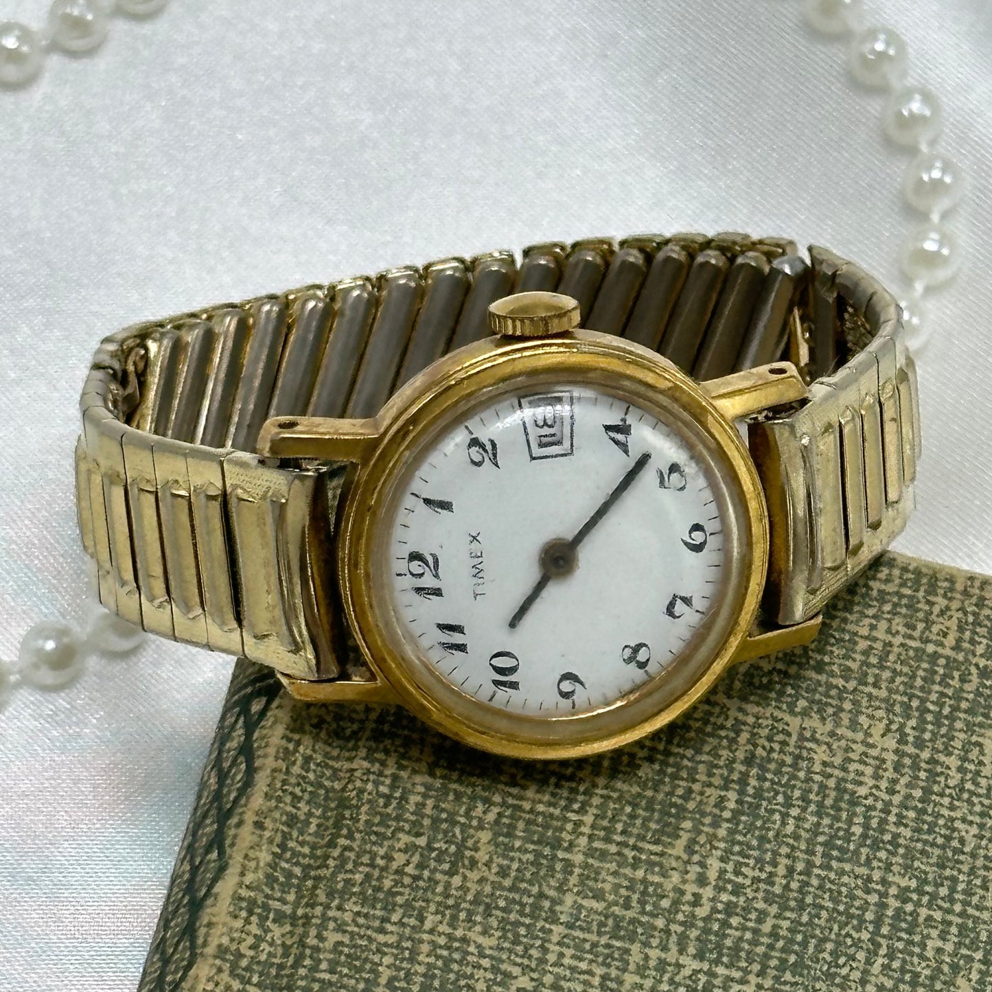 Gold Round Dial Timex Watch with Date Display