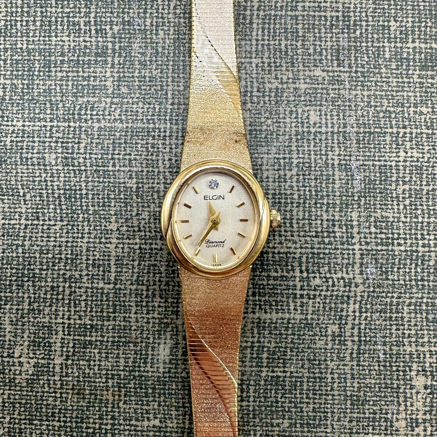 Gold tone Elgin Diamond watch with quartz