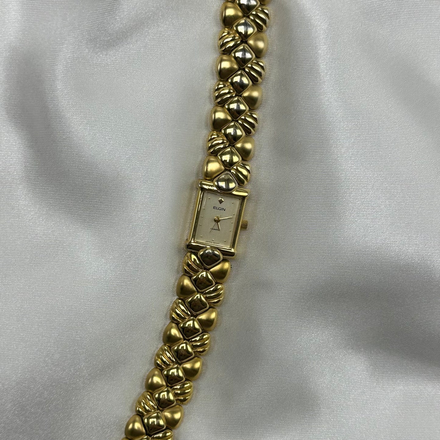 Gold tone Elgin square dial watch with quartz movement