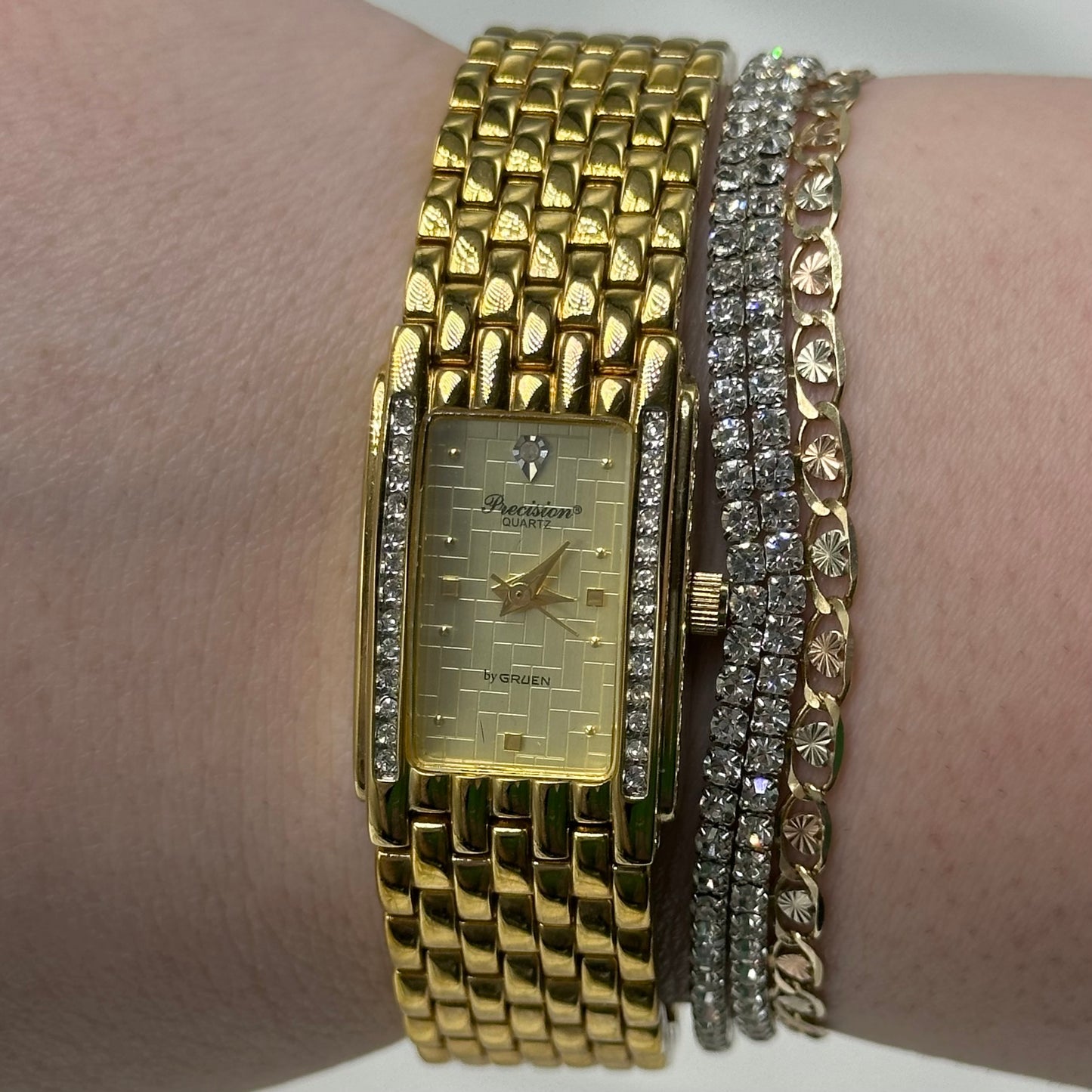 Gold tone diamanté Gruen Precision watch with quartz movement and clasp band