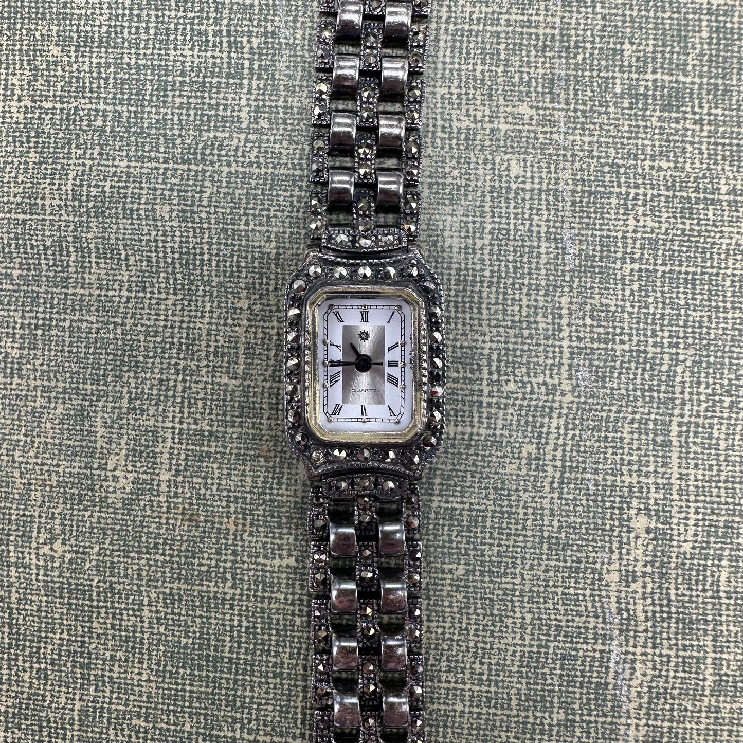Sterling silver marcasite watch with clasp band. Missing the crown.