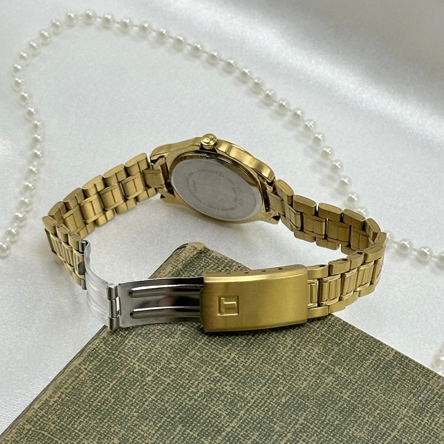 Tissot 1853 Pro 50 gold tone Swiss made watch with date display and quartz movement.