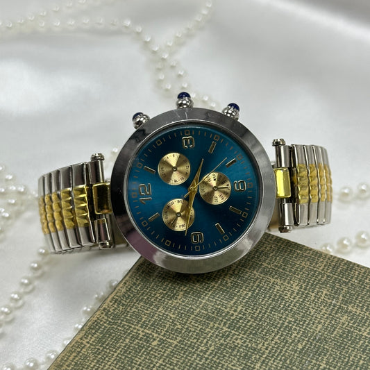 Unique Blair silver and gold tone chronograph watch with blue dial and stretchable band.