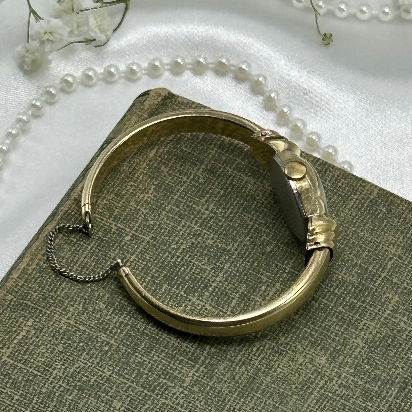Vintage 10k gold filled Benrus Swiss manual winding cuff watch with unique safety