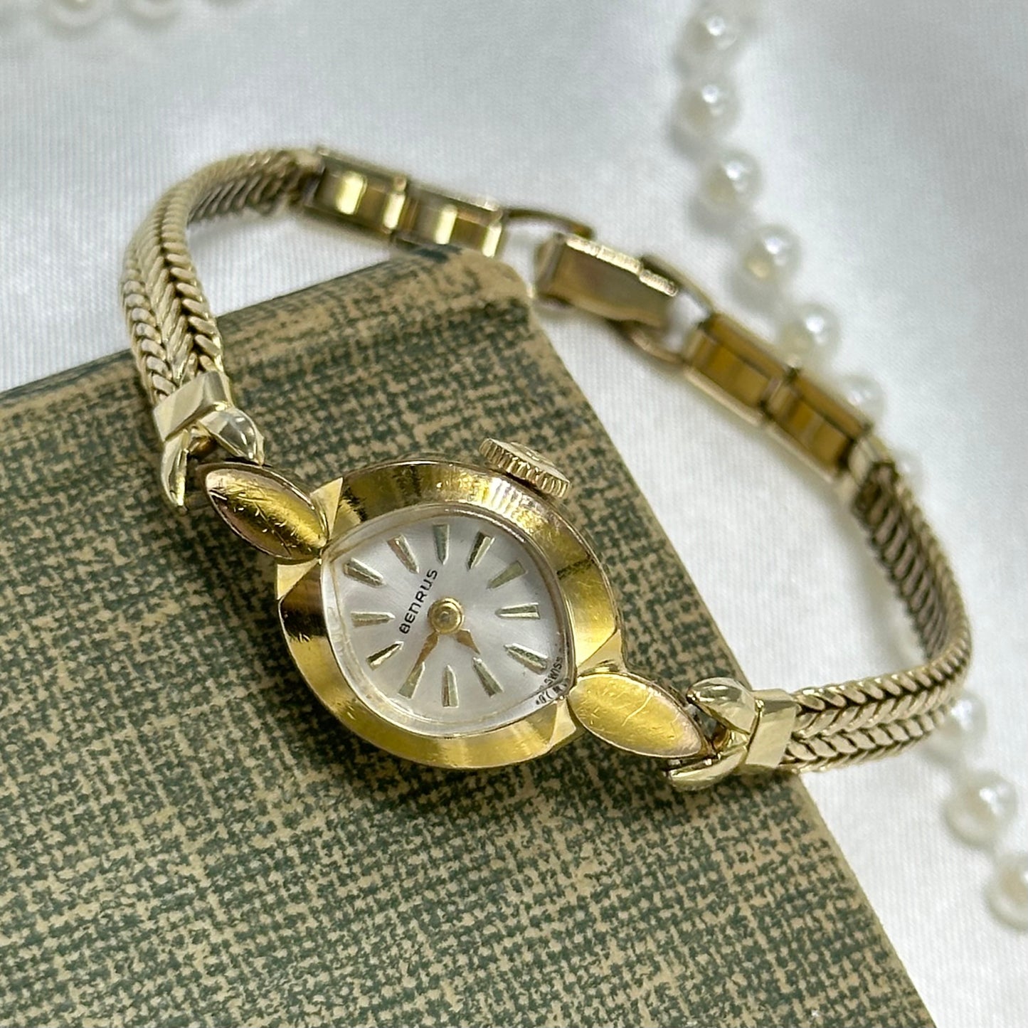 Vintage Benrus manual winding cocktail watch from the 1960's with detailed braided 10k RGP band. Watch comes with original B crown. 20 micron gold electroplated bezel with 10k RGP back.