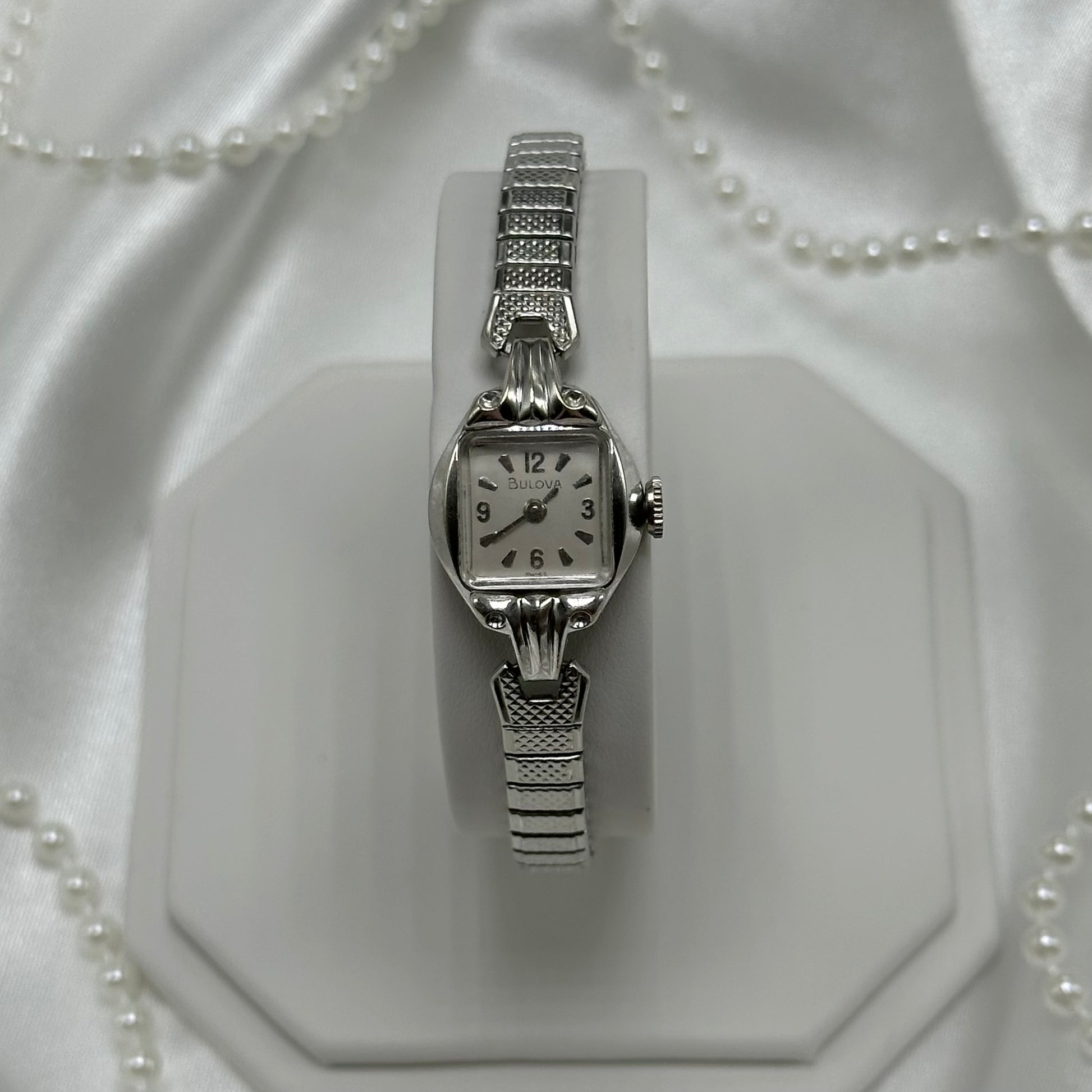 Vintage Bulova 10k rolled gold-plated manual winding watch with stretchable band from the 1960s