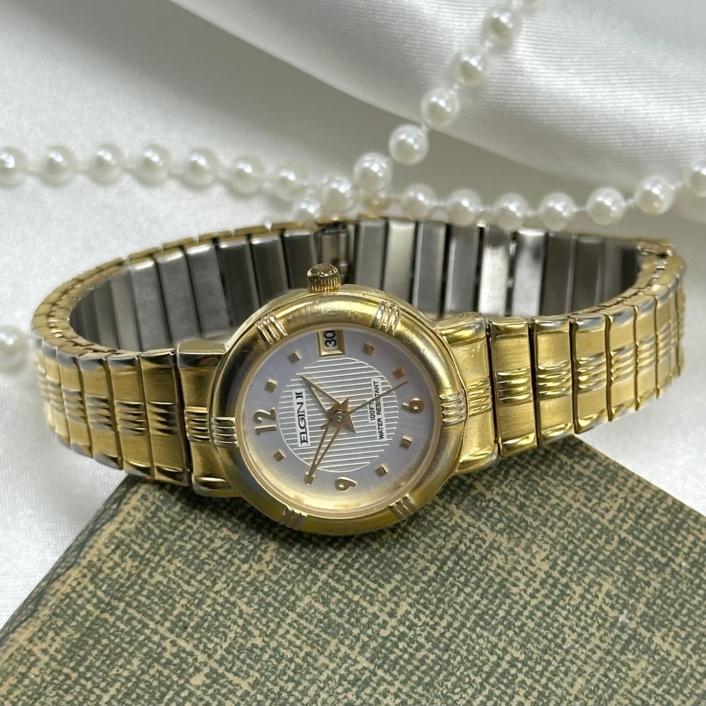 Vintage Elgin II water resistant watch with date display