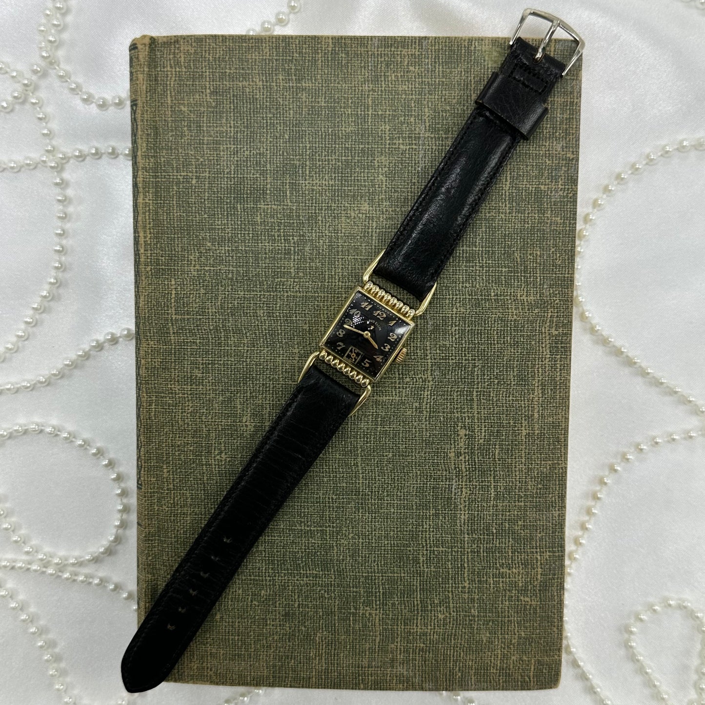 Vintage gold tone Lord Elgin black dial watch with black Norwegian calf band and second dial.
