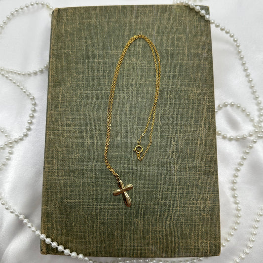 Vintage gold tone cross necklace.