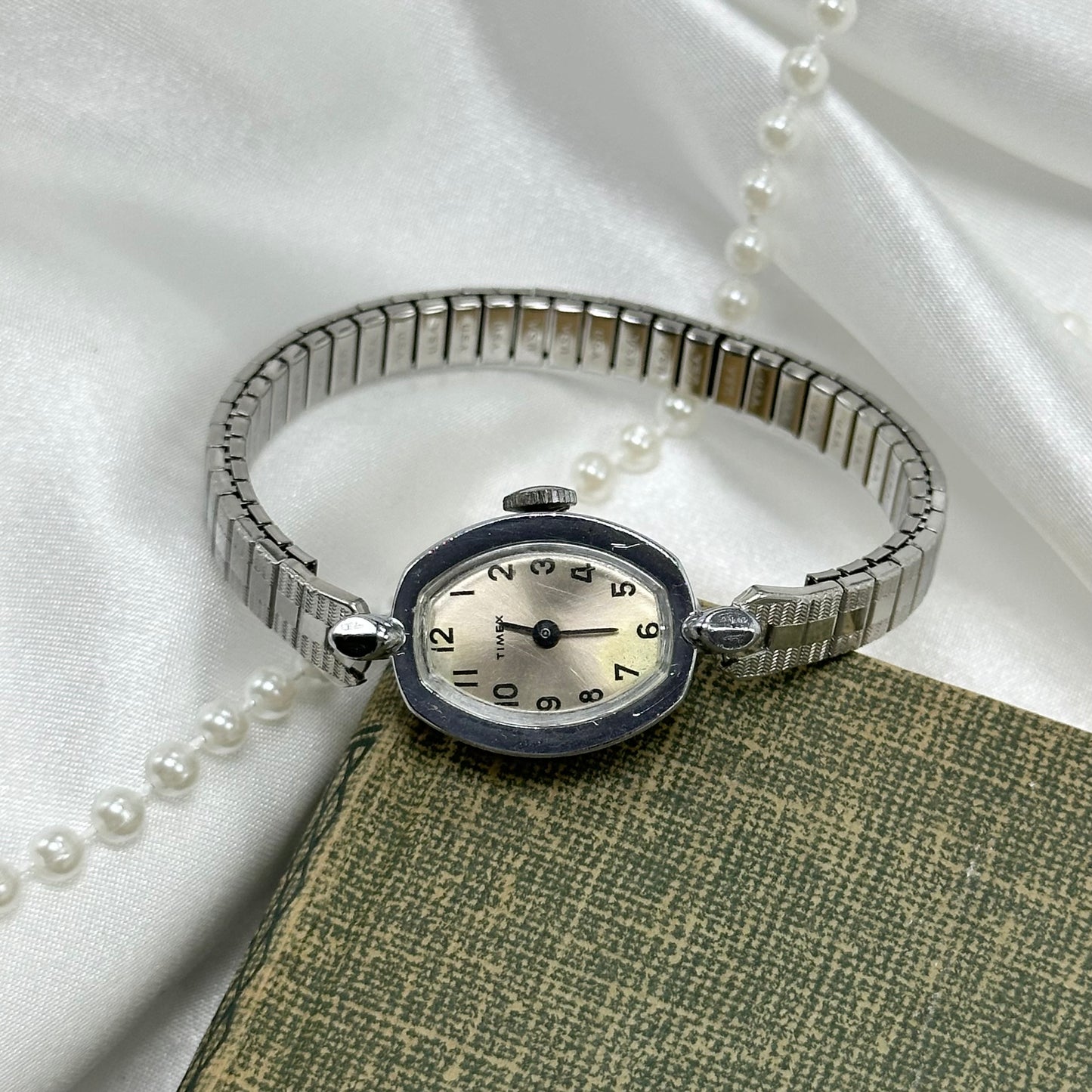 Vintage silver tone Timex manual winding women's watch