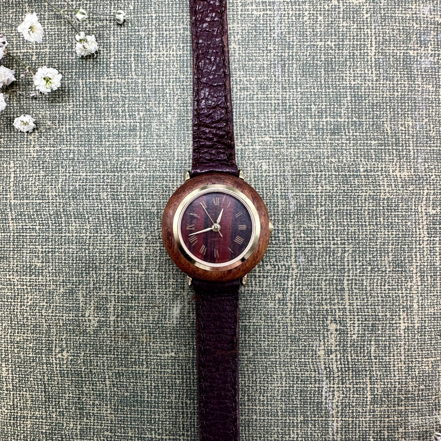 Vintage wood case watch with gold tone accents and quartz movement